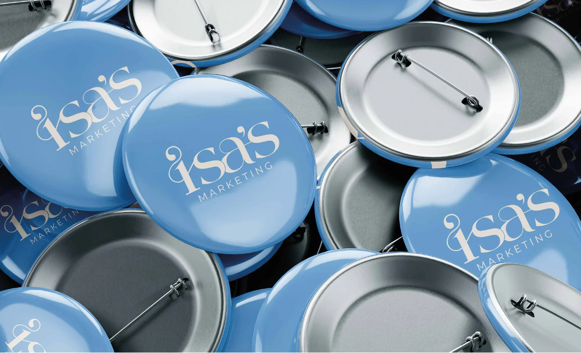 Botones azules con el logo de Isa's Marketing